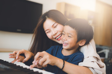 happy asian family at living room,happiness time of family playing at home,dad Mom and baby are happiness coexistence,happy family concept and Creating activities to strengthen skills for children.