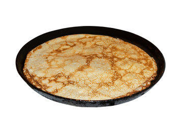 Pancake is prepared in a cast iron pan