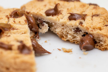 Creamy chocolate filling cookies. Drops of creamy chocolate on homemade biscuit.