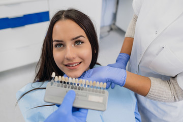 Beautiful girl at dentist office. Tooth whitening