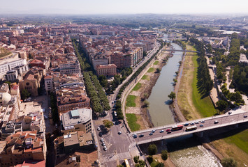 Aerial view of Lleida  city with a  apartment buildings and river