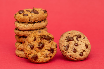 tasty cookies in detail, with red background.