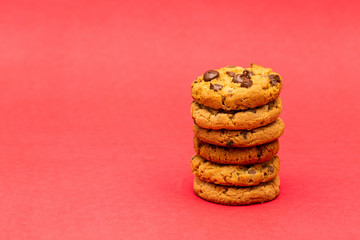 tasty cookies in detail, with red background.
