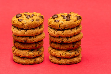 tasty cookies in detail, with red background.