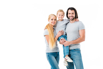 Amazing family hugging and smiling at camera isolated on white