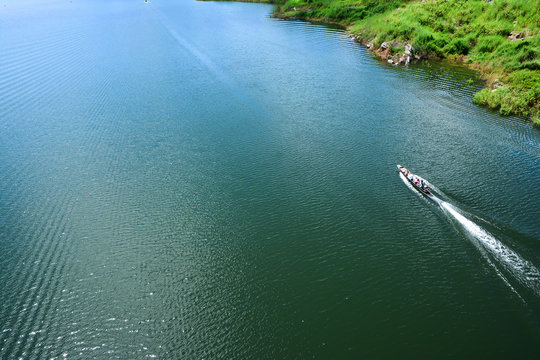 Small fishing boat at Mae Kuang Udom Thara dam in Chiang mai.Thailand