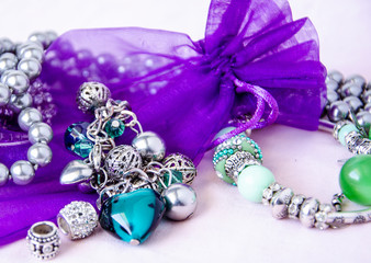 Gift bag in retro style with pearls with jewelry for women.