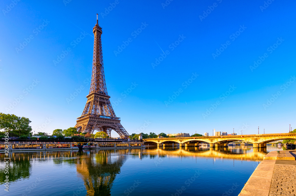 Canvas Prints view of eiffel tower and river seine at sunrise in paris, france. eiffel tower is one of the most ic