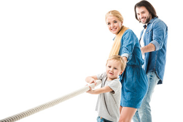  happy family pulling the rope and playing tug of war isolated on white