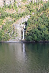 Fototapeta na wymiar Waterfall in the Næroyfjord, Norway