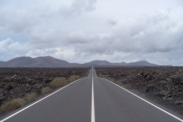 Road going through wilderness area, Lanzarote, Spain