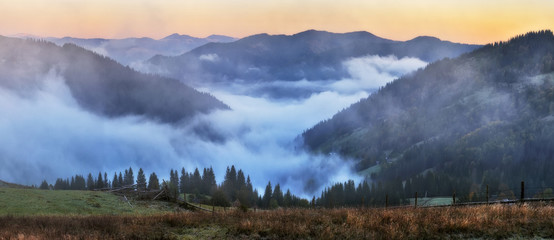 autumn morning in the Carpathian mountains. scenic foggy dawn