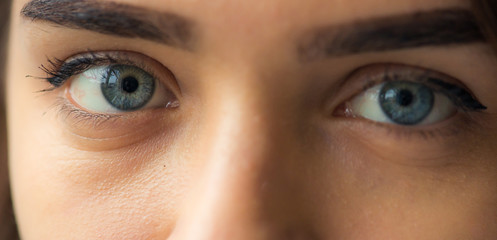 blue-gray eyes of the young girl