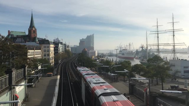 Hamburg, Germany. Timelapse U-Bahnhof Landungsbrücken mit Blick auf Elbphilharmonie