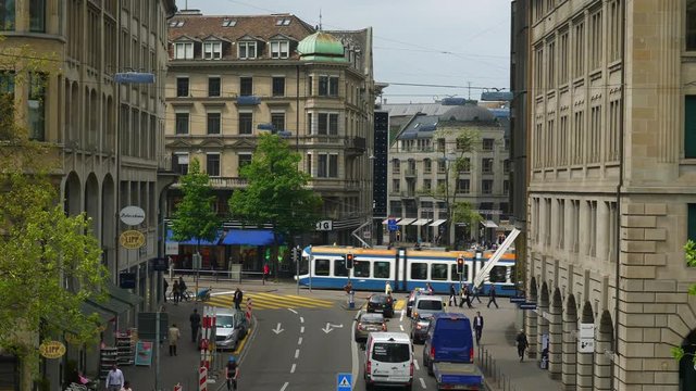 sunny day zurich city center traffic street rooftop slow motion panorama 4k switzerland
