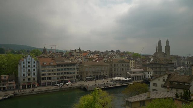 cloudy day zurich famous cityscape riverside rooftop slow motion panorama 4k switzerland

