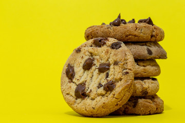  Delicious chocolate biscuits, American biscuits, with yellow background.