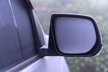 The steam fog on the car mirror