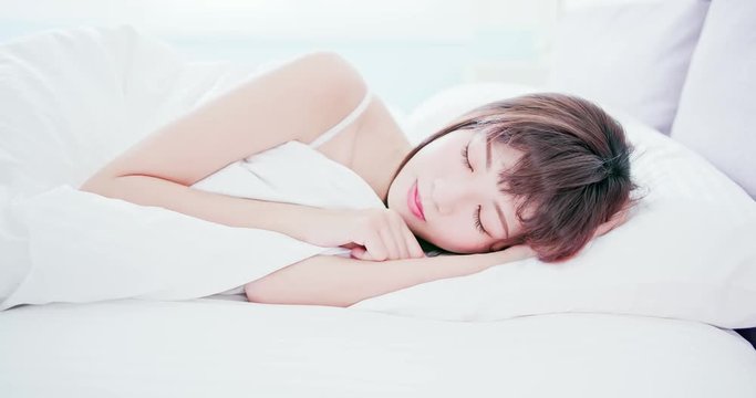 woman sleeping well in bed