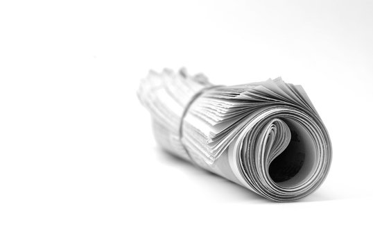 Newspaper Rolled up Isolated on White for News