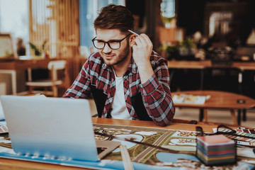 Graphic Designer Concentrated on Work Project