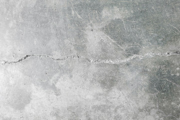old concrete cement wall with crack in building background