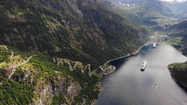 Aerial view. Fjord Geirangerfjord with cruise ship, view from Ornesvingen viewpoint, Norway. Travel destination