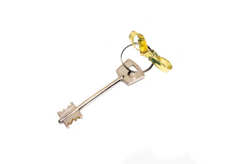 apartment key with gold bow on white isolated background