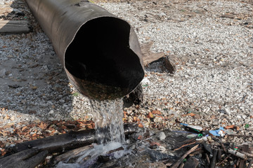 Discharge of toxic or contaminated water into a river or lake.