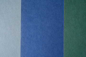 Fototapeta na wymiar blue paper texture background. colored cardboard fibers and grain