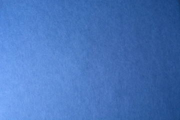blue paper texture background. colored cardboard fibers and grain