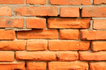 corrosion of the debris of the red brick wall