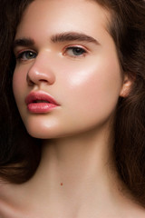 Close-up beauty woman with clean shiny skin and natural cosmetics. Fashion, spa, cosmetology, lip...