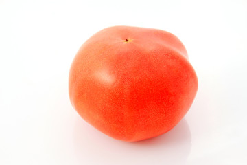 red tomato on a white background