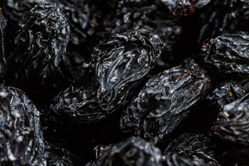 Black Raisin texture, popular dried fruit. Dried grapes.