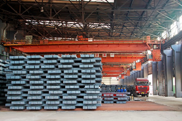 Hot ingot in a steel plant, closeup of photo