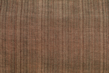 Silk and linen brown color natural fabric texture closeup as textile background