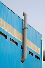 exhaust pipe outside the blue workshop
