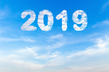 Naklejka na ściany i meble 2019 New Year text blue sky background with white clouds.