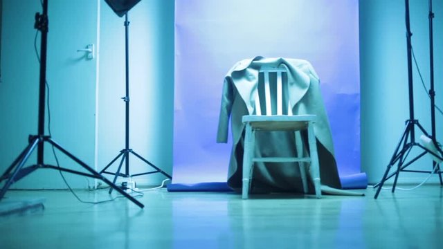 Fresh ice blue coloured wide shot of empty photo studio