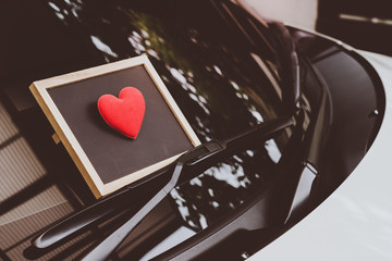 love letter heart on a sticky note under a windshield .vintage  color style