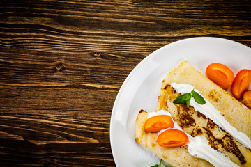 Sweet crepes with apricots