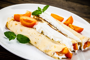 Sweet crepes with apricots