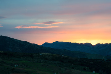 Fototapeta na wymiar Panoramic sunset view on Tajo Gorge (Tajo de Ronda) in Ronda, Spain