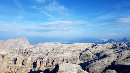 Stone field that looks like the moon with strange rock formations in mountain alps