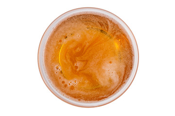 Beer in glass. Beer foam isolated on white background. View from above.