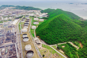 Oil storage tank with oil refinery background, Oil refinery plant at day. Aerial view from drone...