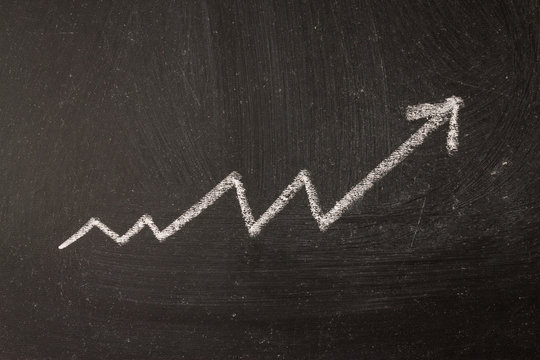 The arrow is a graph of the increase in profit by chalk on the board.