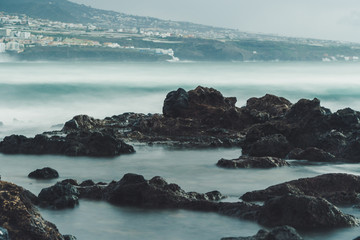 Tenerife Coast with rocks, waves time exposure