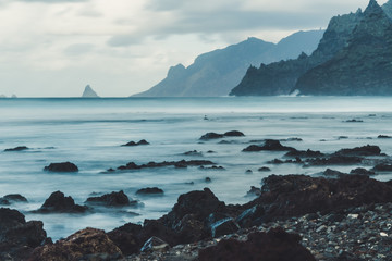 Fototapeta na wymiar Tenerife Coast with rocks, waves time exposure